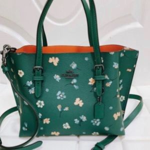 Emerald Green With Floral Print Coach Purse.